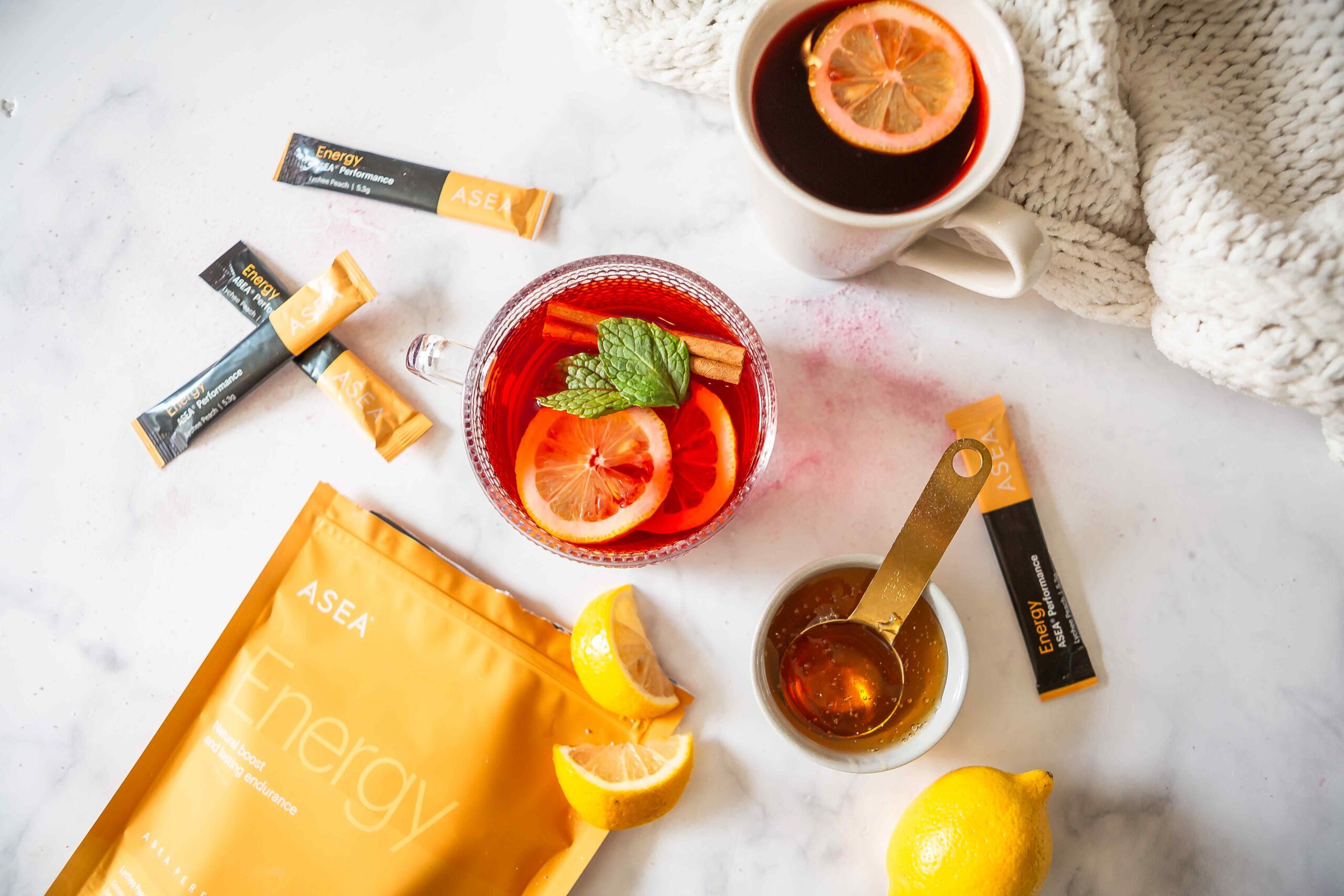 ASEA Energy stick packs displayed in a simple, lifestyle setting that highlights an easy-to-use alternative to traditional morning energy drinks.