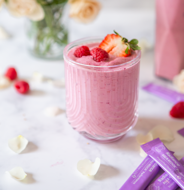 A freshly prepared pink smoothie shown ready to enjoy, emphasizing its smooth texture and vibrant color.