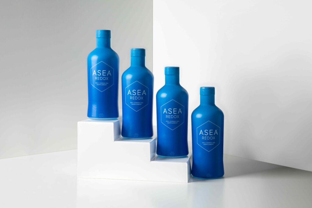 Multiple bottles of ASEA Redox Cell Signaling Supplement displayed to represent the benefits of supporting cellular communication and whole-body wellness.