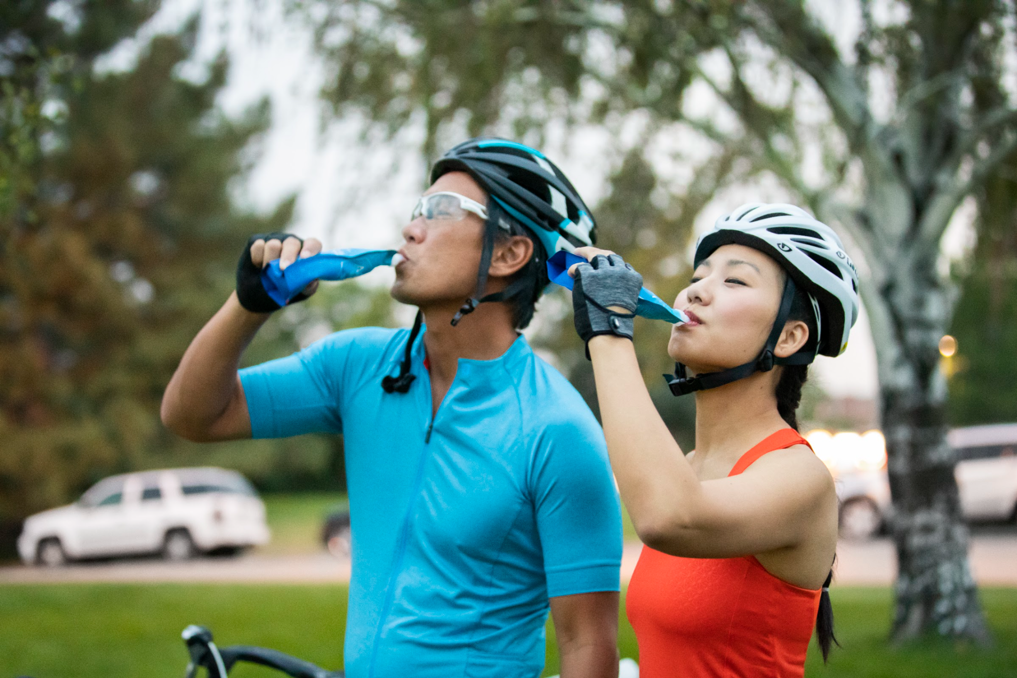 Two cyclists consuming ASEA Redox, the supplement evaluated in an athlete study examining redox signaling molecules and metabolic activity during exercise.